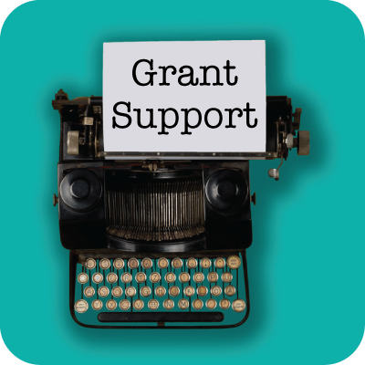 Old typewriter with 'Grant Support' typed on the paper